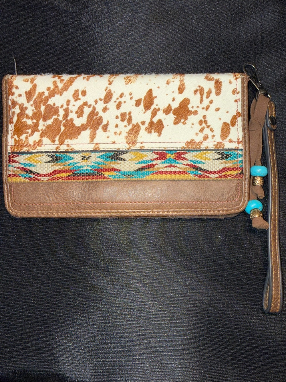 Justin Boots Tan and Cream Cowhide Wristlet with Turquoise Bead Accents